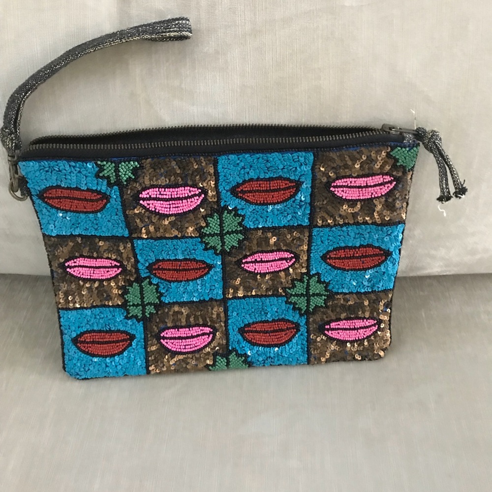 beautiful beaded zippered envelope bag. many uses.